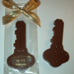 Milk Chocolate Key In Cello Tied with Gold Bow