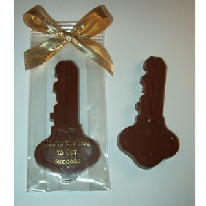 Milk Chocolate Key In Cello Tied with Gold Bow 